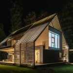 Smart wired house at night. NBG Digital Home. Electric Vehicle chargers, Solar and Heat Pumps, General Electrical Services in the South West.